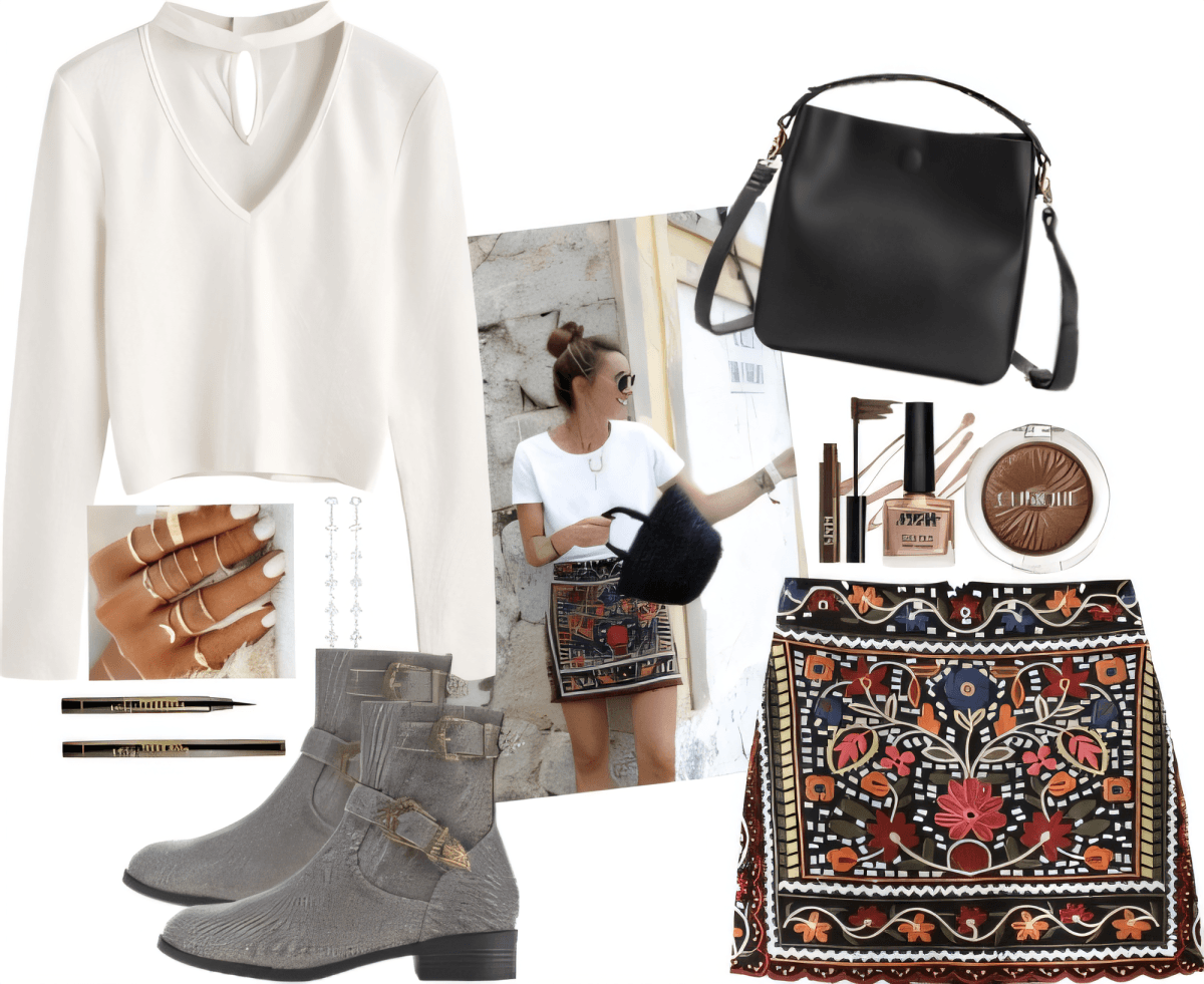 Conjunto casual chic con suéter blanco de cuello en V, minifalda bordada, botines grises, bolso bandolera negro y accesorios.