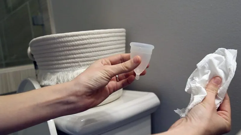 Wipe your cup using a tissue 
