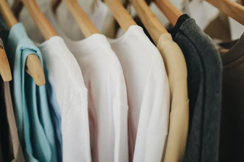 Clothes hanging on hangers.