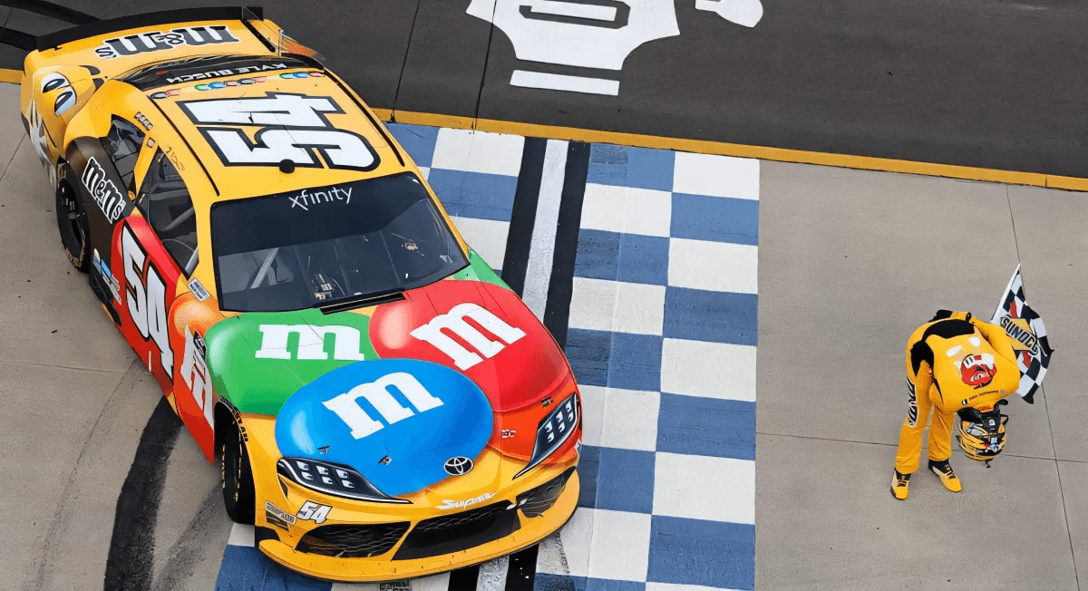 Candyman Kyle Busch Takes Home Guitar Trophy In Nashville For Record-setting 100th Xfinity Series Win by Joseph Poulos