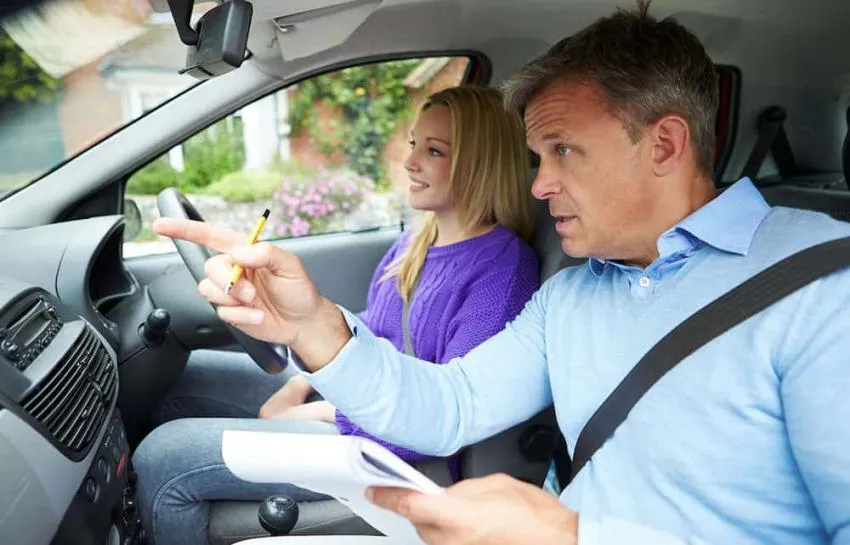 driving instructor and student driving instructor