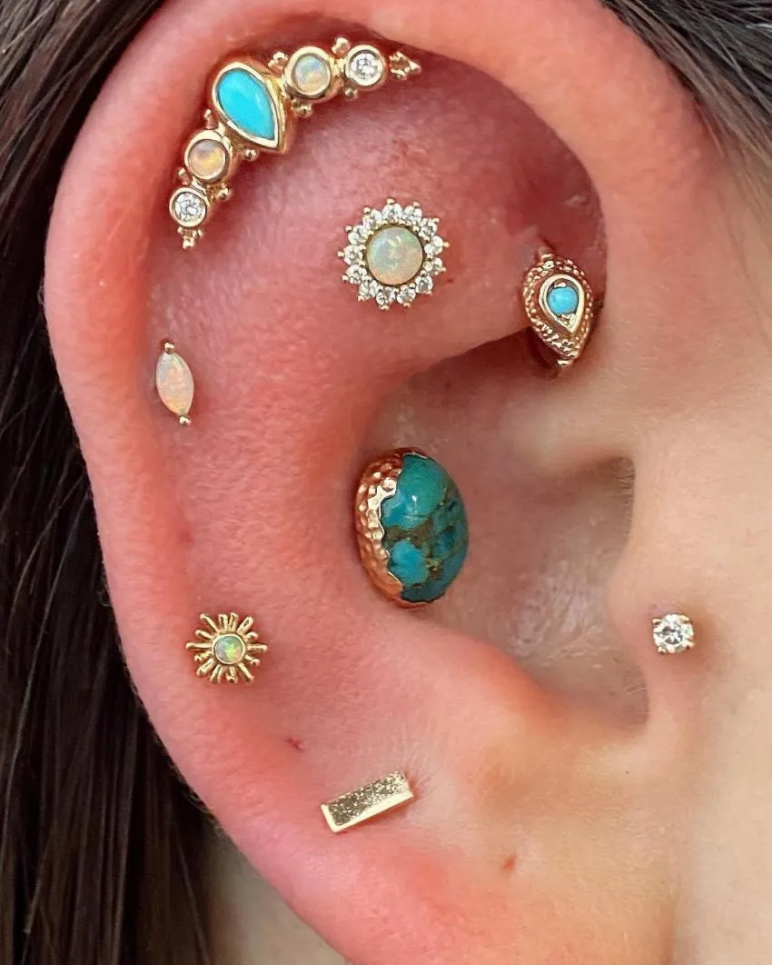 Perforación de orejas curada curated ear piercing