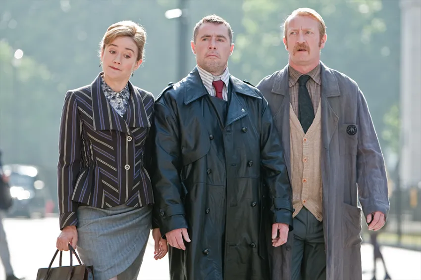 Bland muggle attire instead of robes on Ministry employees