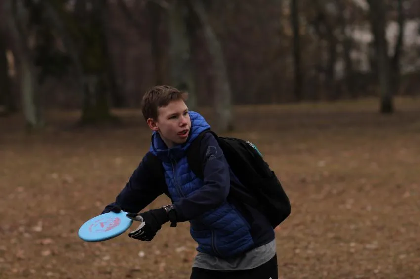 frisbee boy catching frisbee
