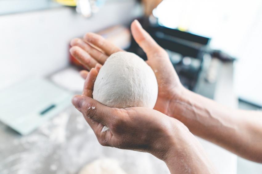 Floury Dough Ball Dough being handled before Kneading