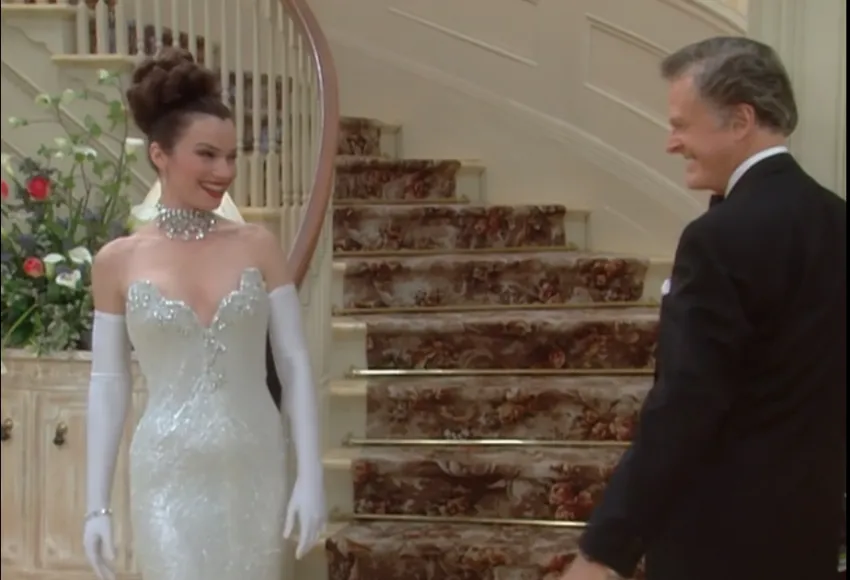 Fran Fine wearing Audrey Hepburn type silver dress