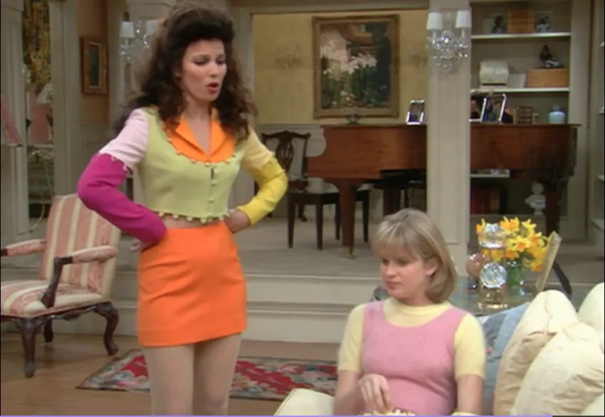 Fran Fine wearing color block two piece