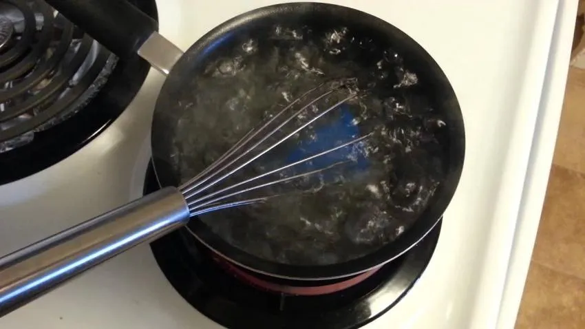 Use a whisk to boil the cup 