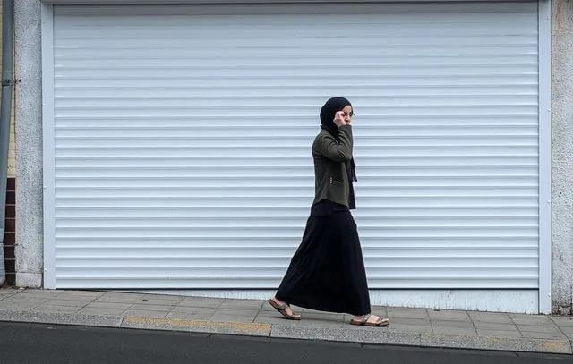 woman walking in long skirt