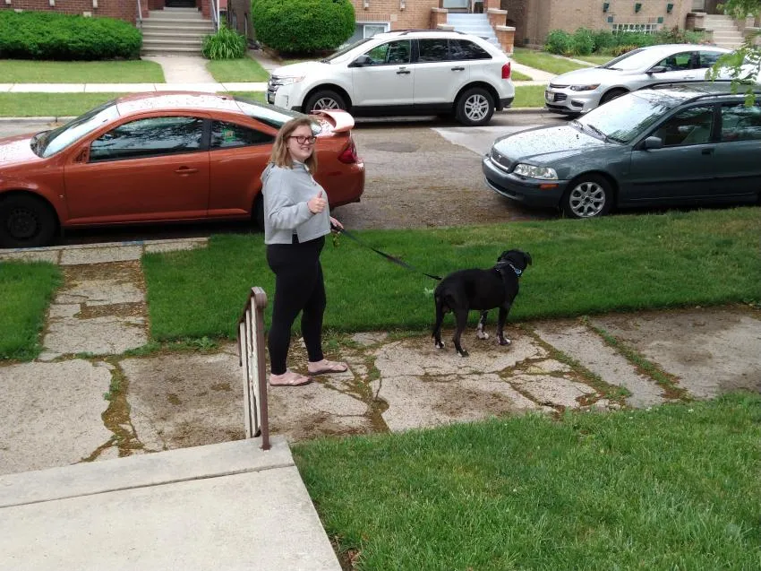 Woman walking her dog