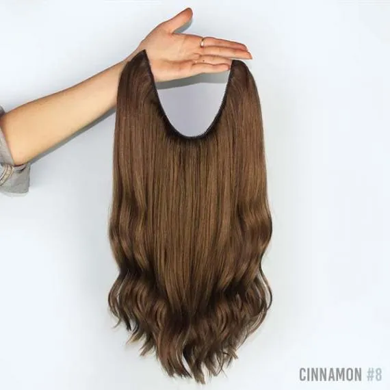 Halo extensions being held up by a hand