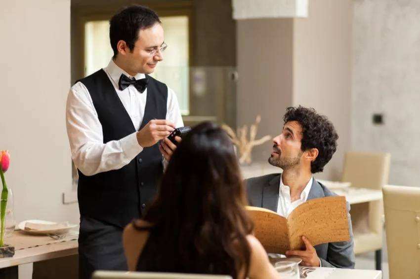 acknowledge your food server at a restaurant
