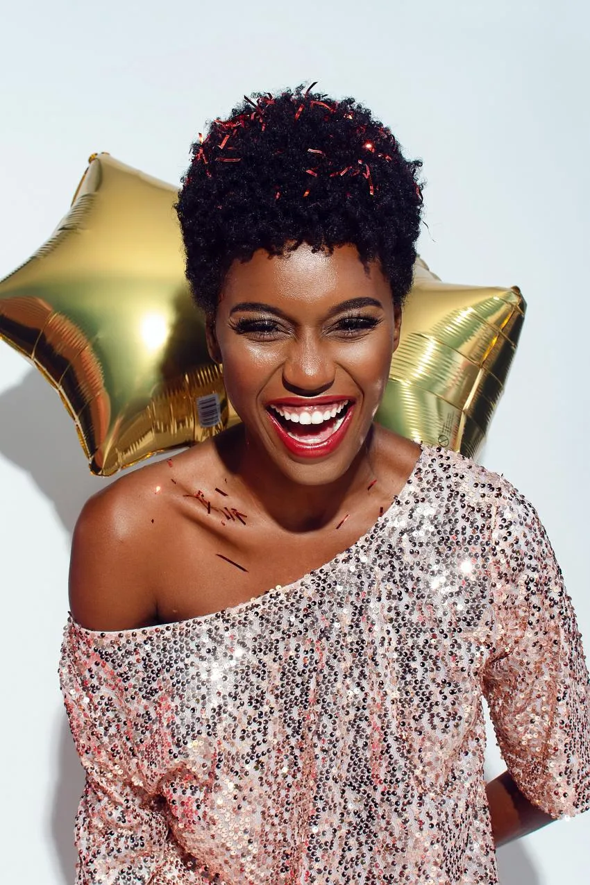 Woman wearing sparkly dress to feel sparkly and happy