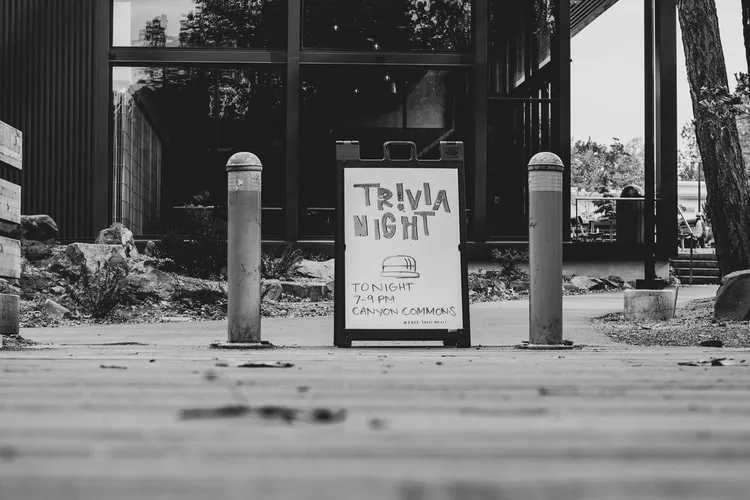 Sandwich board that says 