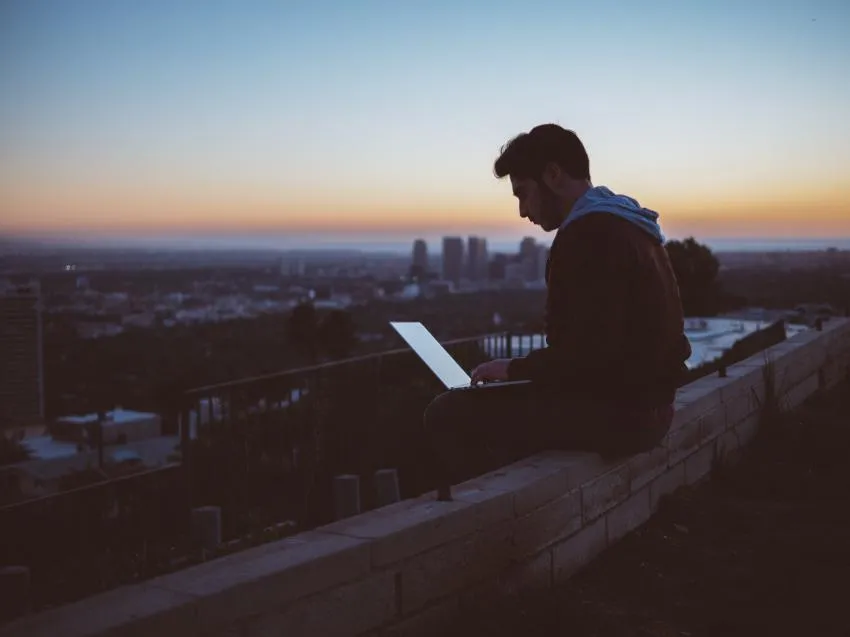 Avi Richards, Unsplash, Man on Roof Avi Richards, Unsplash, Man on Roof