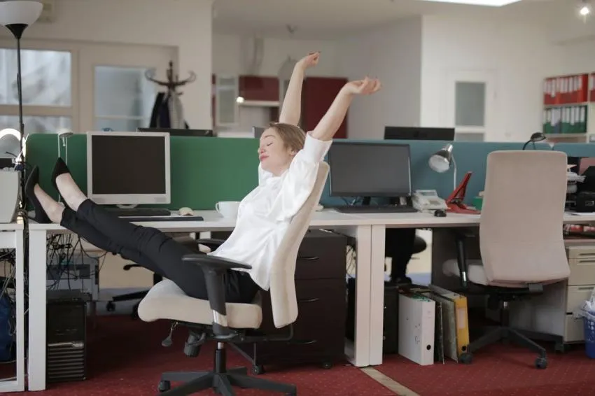 A person spinning in a spinning chair