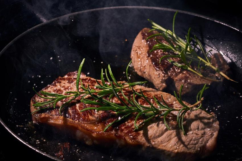 Steak A Well Done Steak with Rosemary Sprigs