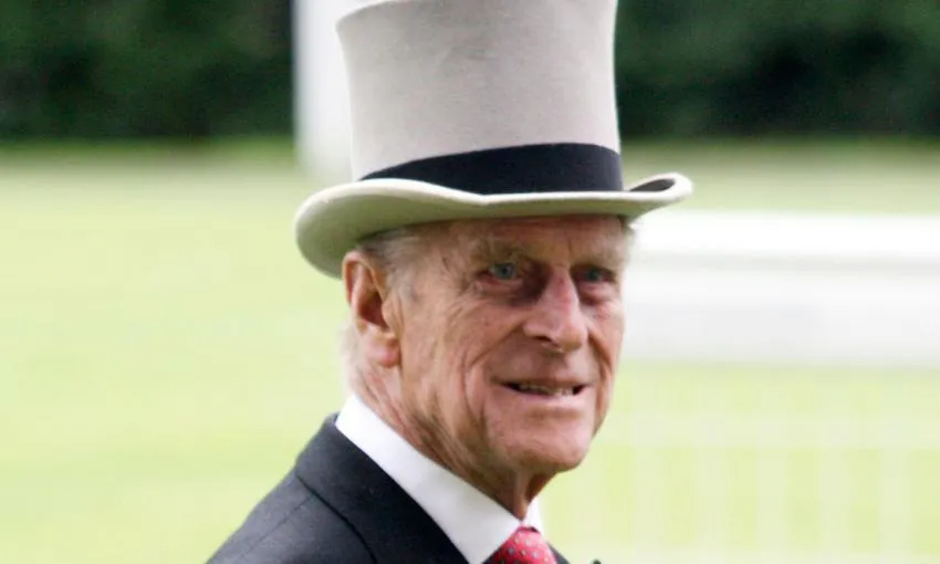 Prince Phillip poses for photo in dress outfit