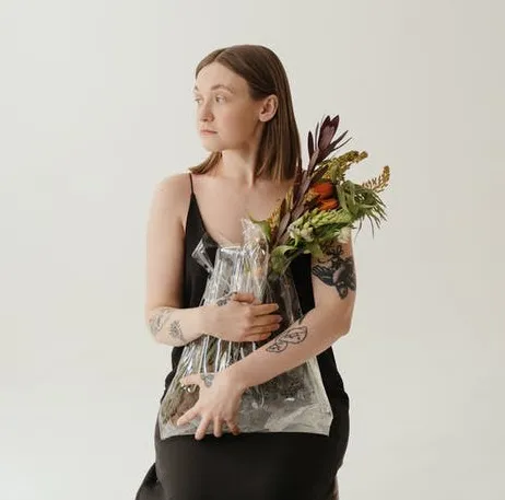 woman carrying flowers on first date woman carrying flowers on first date