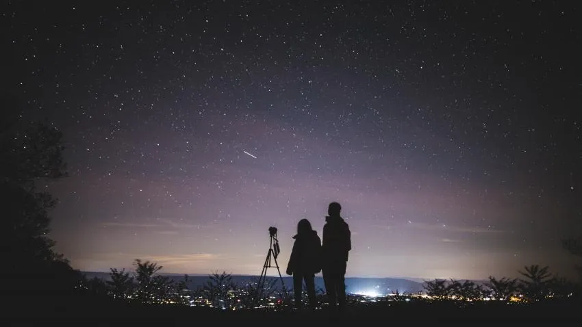 silhouette of couple star gazing silhouette of couple star gazing