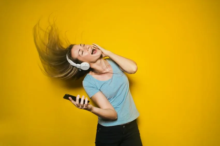 woman listening to music caffeine and music