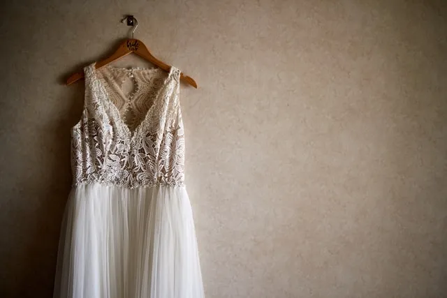 white wedding dress on hanger