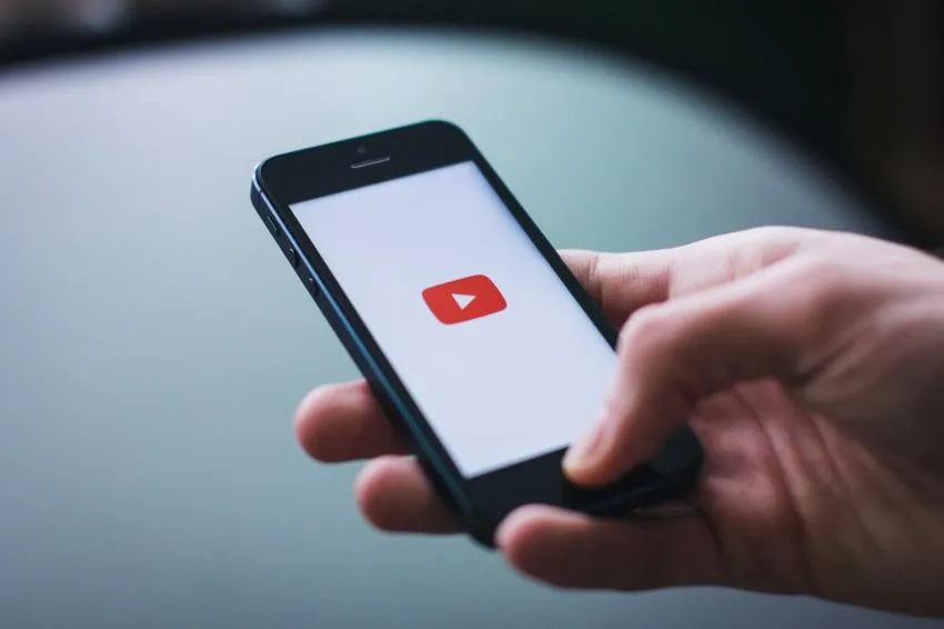 A phone with YouTube open