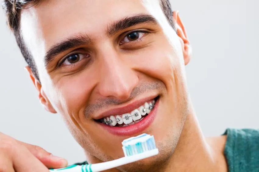brush and floss braces  brushing and flossing teeth with braces