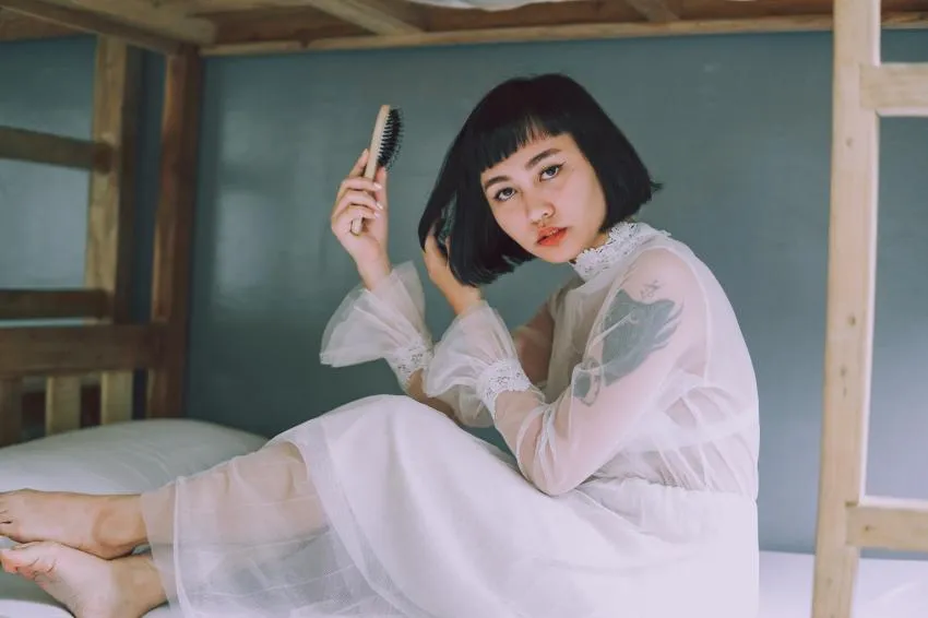 Girl brushing her hair
