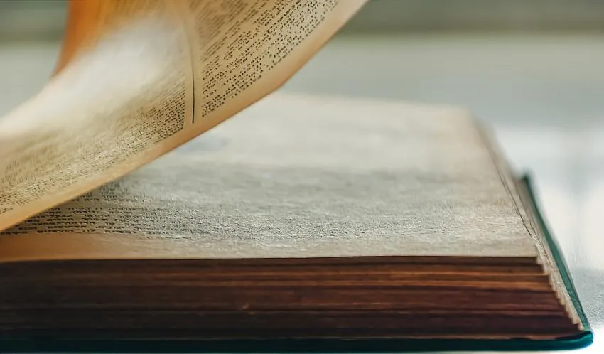 An open book A book with ancient text
