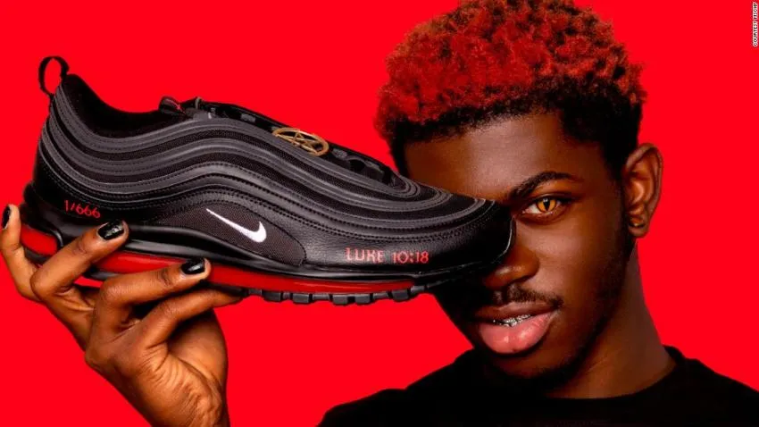 Satan Shoes by Lil Nas X Lil Nas X Posing with signature Satan Shoes