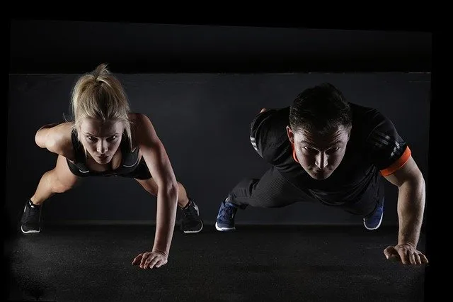 man woman pushups